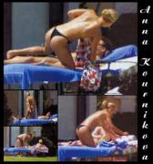 Anna Kournikova topless sunbathing