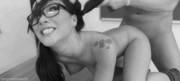 Glasses and a tattoo