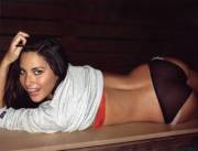 Olivia Munn laying down