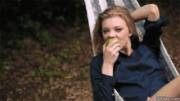 Natalie Dormer eating an apple