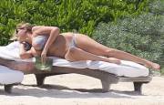 Kate Upton sunbathing