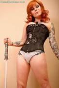 Sexy lightsaber-wielding redhead.