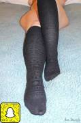 Showing off her soft black knee highs!