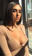 She wears that top well