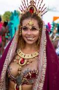Carnival babe with nipple tattoos