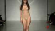 Lingerie model with transparent body suit