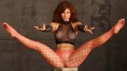 Heather Vandeven in fishnet top, fishnet gloves, and fishnet hose.