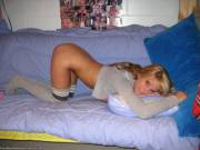 Blonde posing in college dorms