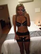 Blonde wearing lingerie &amp;stockings.