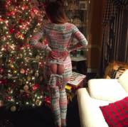 Sis always wears my favorite pajamas when we open Christmas presents