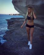 By the water