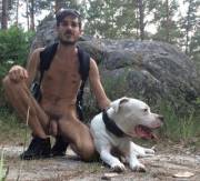 Hiking with his dog. You know, I need to get outdoors more and go hiking...