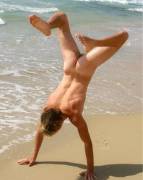 Headstand near the sea