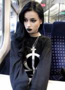 Lil' Goth Girl alone on the bus