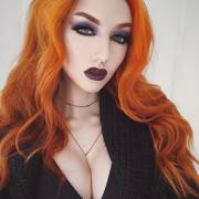 Red hair, dark lips