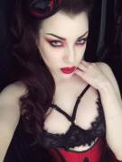 Threnody, piercing eyes and red lipstick