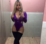 Busty blonde in purple leotards