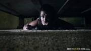 Katerina Jade hiding under the bed