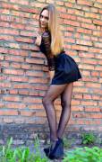 by the wall