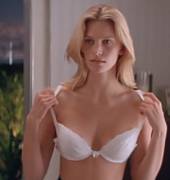 Natasha Henstridge removing her bra to reveal "golden globes" [gif]