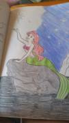 My little girl is coloring to calm down after an argument about string theory, of all things. I love her :)