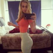 Petite blonde in a tight ensemble