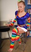 Cutie in a tight satin dress wears rainbow socks and gloves and looks sexy (gallery is in comments)