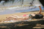 Margot Robbie sunbathing topless