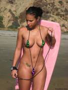 Check out her itsy bitsy teenie weenie bikini