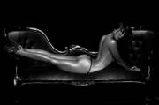 arching her back on the couch