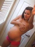 Covering her boobs