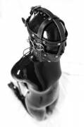 Hooded, muzzled then bound on the floor (from /r/bondage)