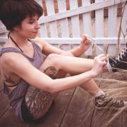 Tying her shoes