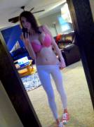 Pink bra and white yoga pants