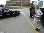 Goofing in a parking lot.