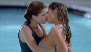 Denise Richards and Neve Campbell in a pool