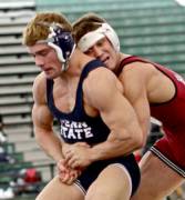 Nittany Lion showing of his striations under his school singlet.