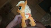 [M]y Applejack plushie gets a taste of cream.