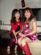 Two beautiful mature Asian milf enjoying the attention.