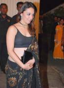 Nauheed Cyrusi in see through black saree at a party. Yummy nipples