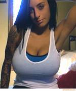 Tattoos and a tank top