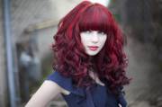 Red curls and bangs