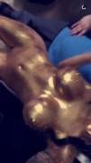 Naked covered in gold