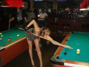 Wife at the bar, playing pool