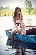 Brunette in an old scow