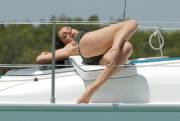 Kelly Brook sunning on the foredeck