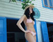 Elizabeth Gillies looking hot in a pink bikini.
