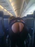 Ass on a plane