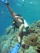 Girl flashing her pussy under water