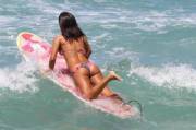 Brunette riding that board